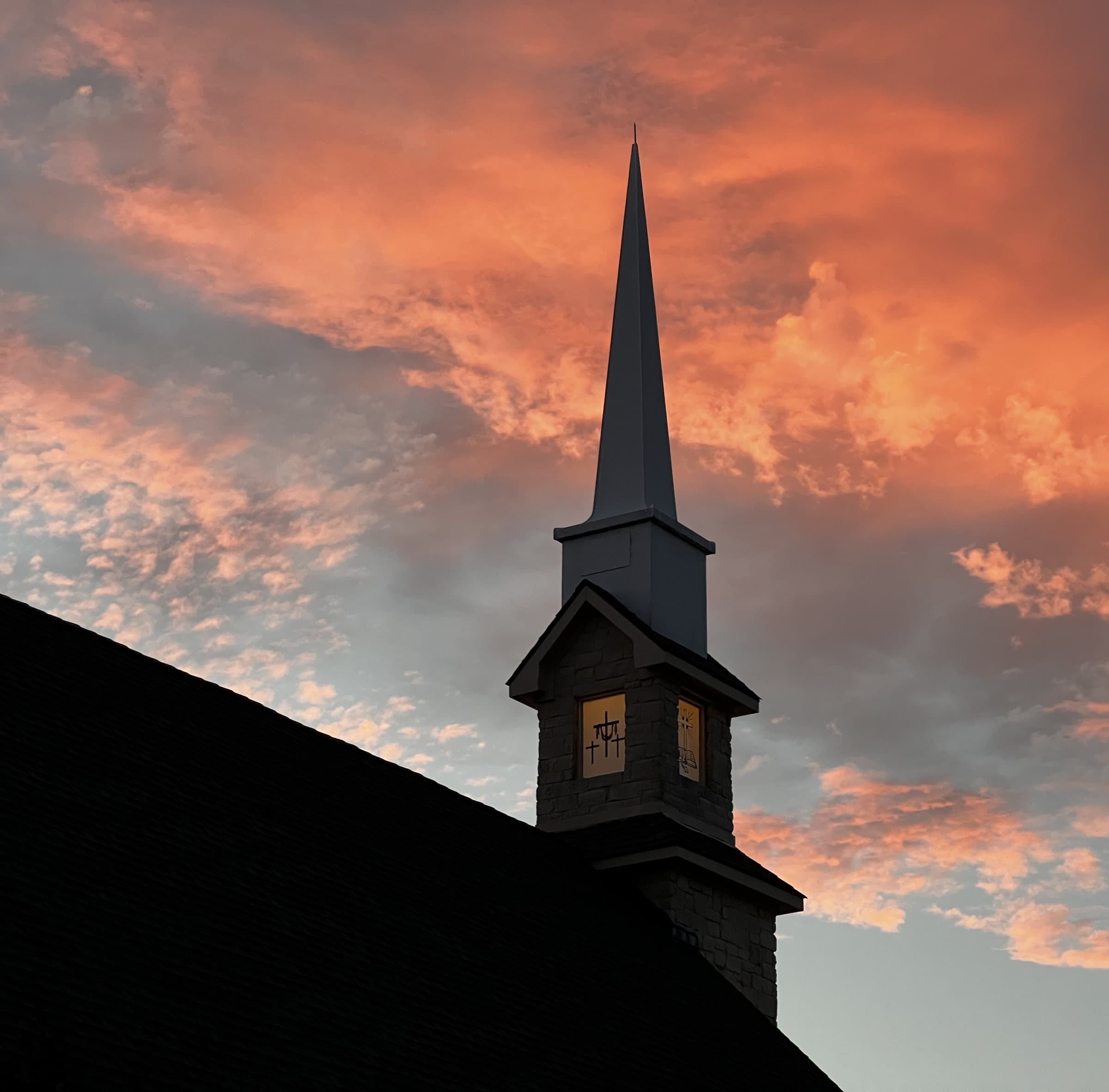 The steeple of Providence Church at sunset